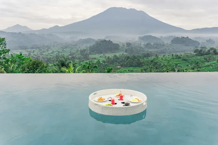 Floating breakfast in a tropical pool