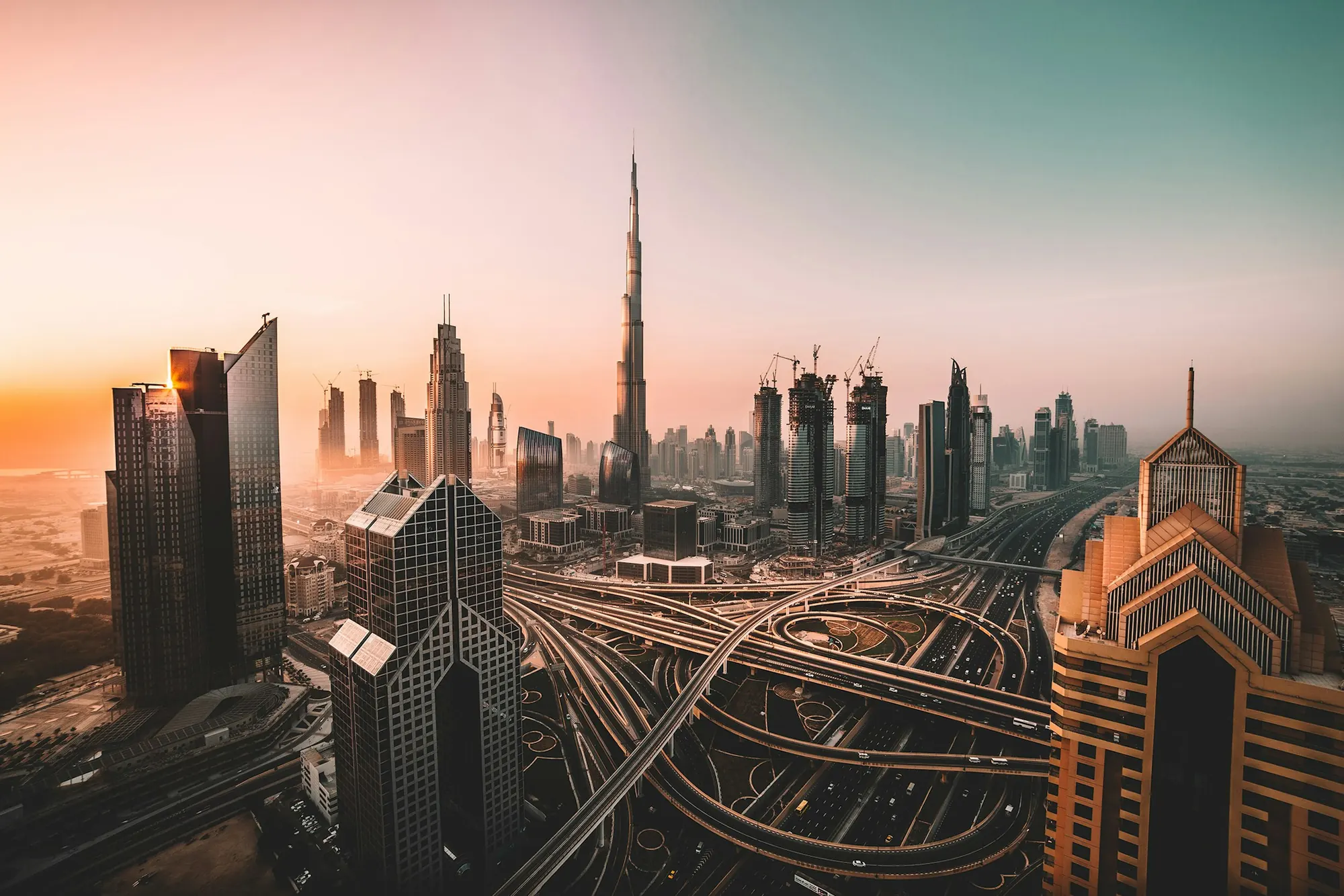Dubai skyline and Burj Khalifa at sunset